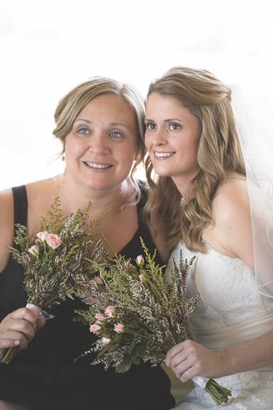 Kelowna wedding, bride and maid of honor with pink bouquets, by Electrify Photography, nelson bc and okanagan wedding photographer