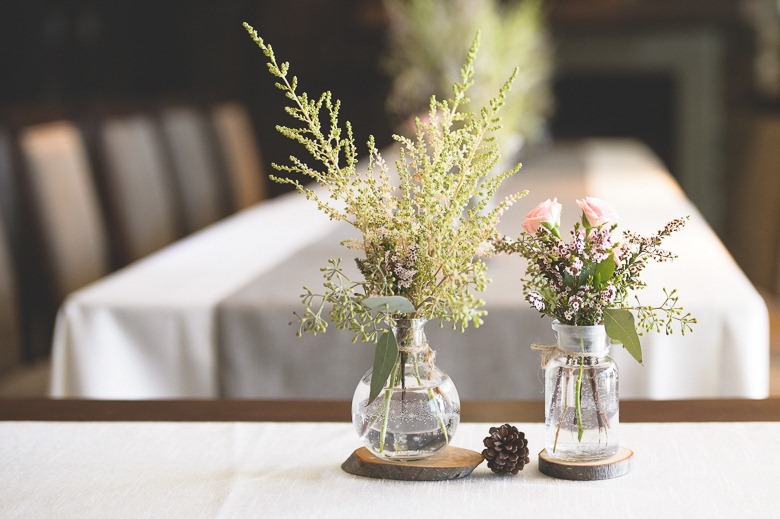 kelowna wedding, reception decor, flowers and pine cones, electrify photography, kelowna bc, nelson bc, wedding photographer