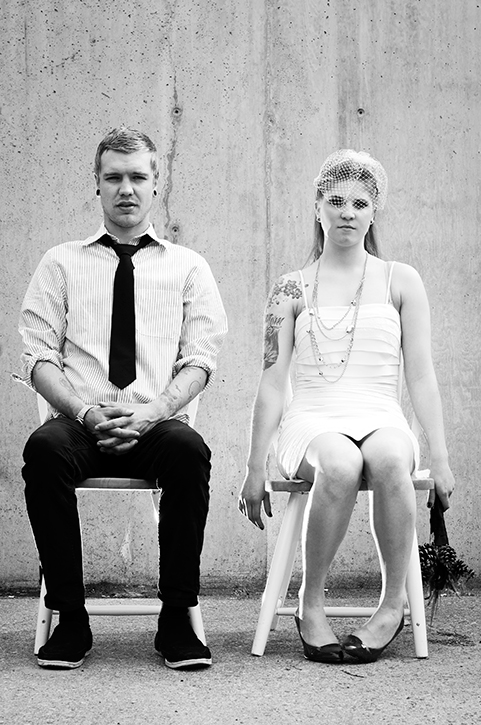 Rock and roll wedding, indie couple in chairs, black and white, by Kootenay Wedding Photographer Electrify Photography